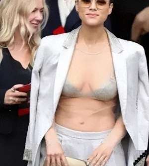 娜塔莉伊曼纽尔(娜塔莉·伊曼纽尔新造型引爆时尚圈，透视装搭西装成焦点)