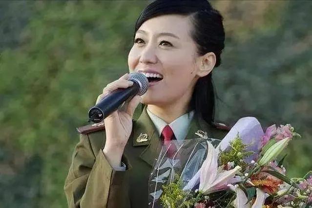 红高粱主题曲《九儿》谭晶演唱。